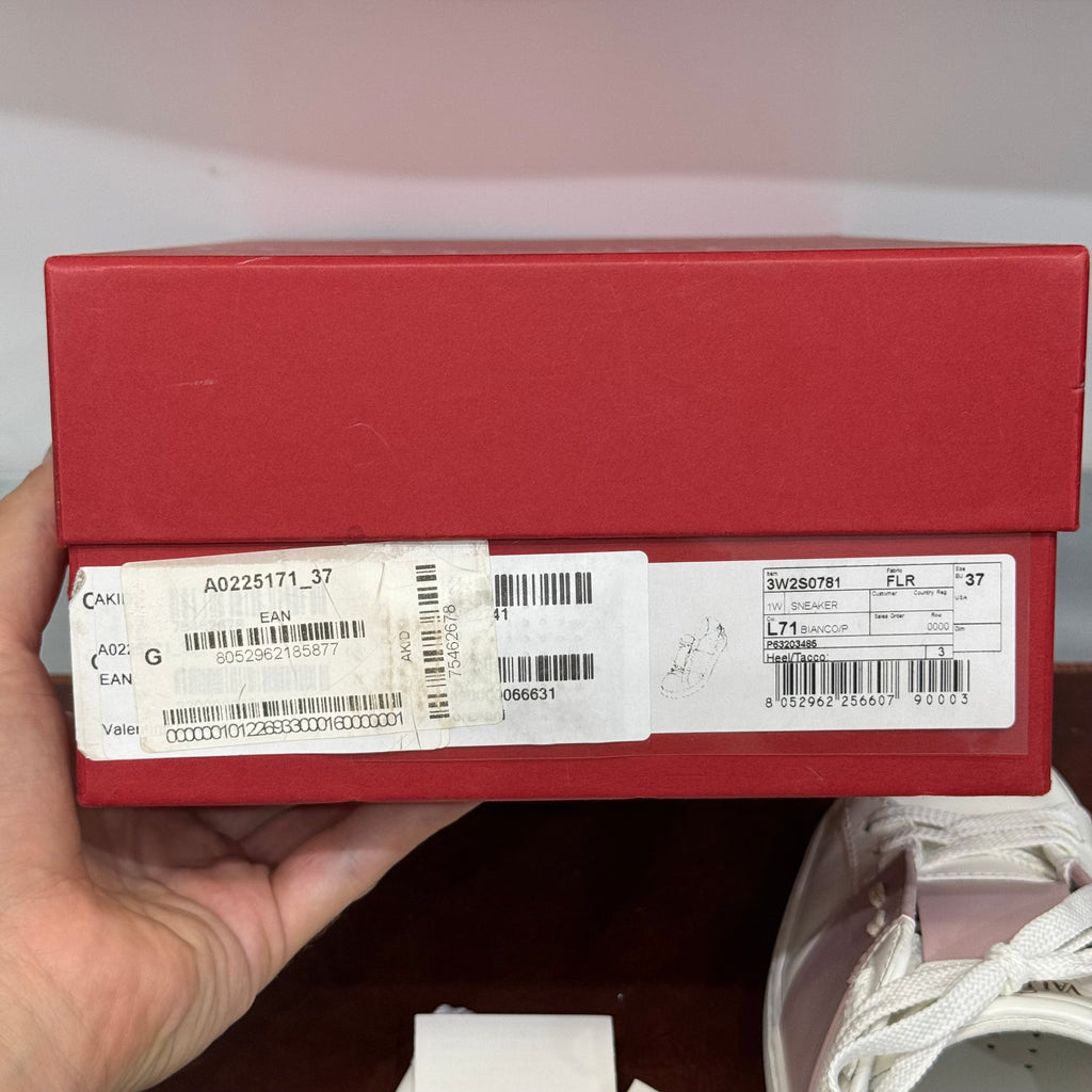 Valentino Garavani, Open, 37